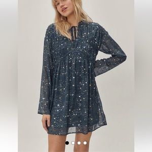 Celestial tie neck smocked mini dress